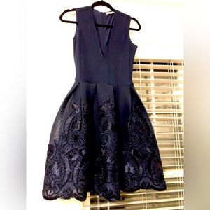 Navy blue embroidered boutique dress with full skirt